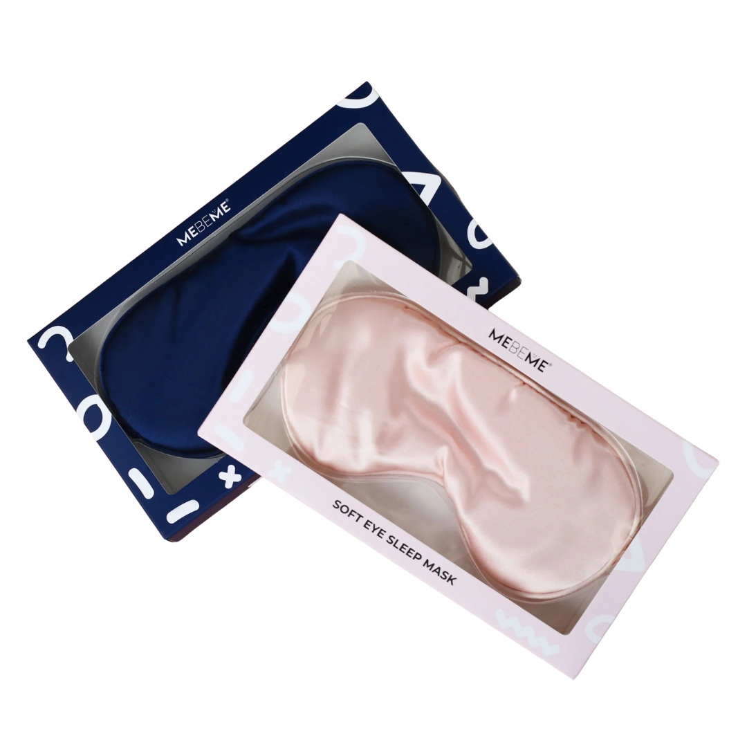 Pink eye sleep mask in open packaging with 'ME&WE' branding on a white background