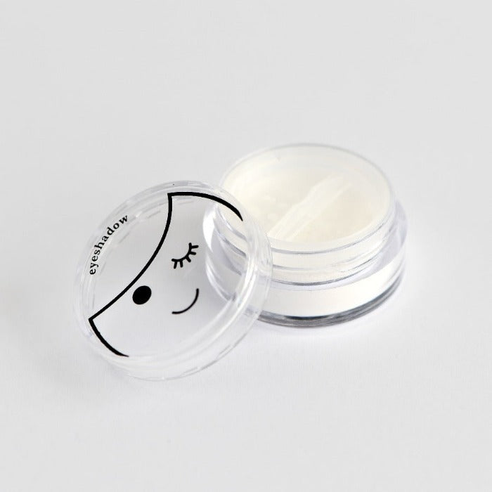 white kids eyeshadow with little face on lid