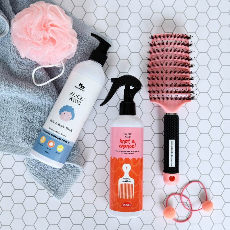 detangler-and-bodywash-on-tiles