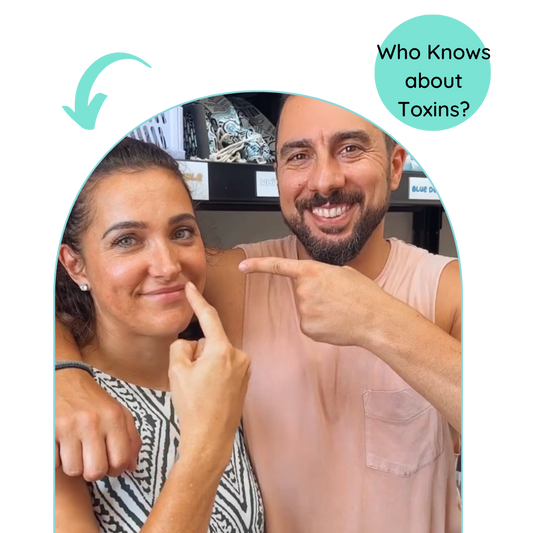 man and woman with woman pointing at her face and man pointing at woman