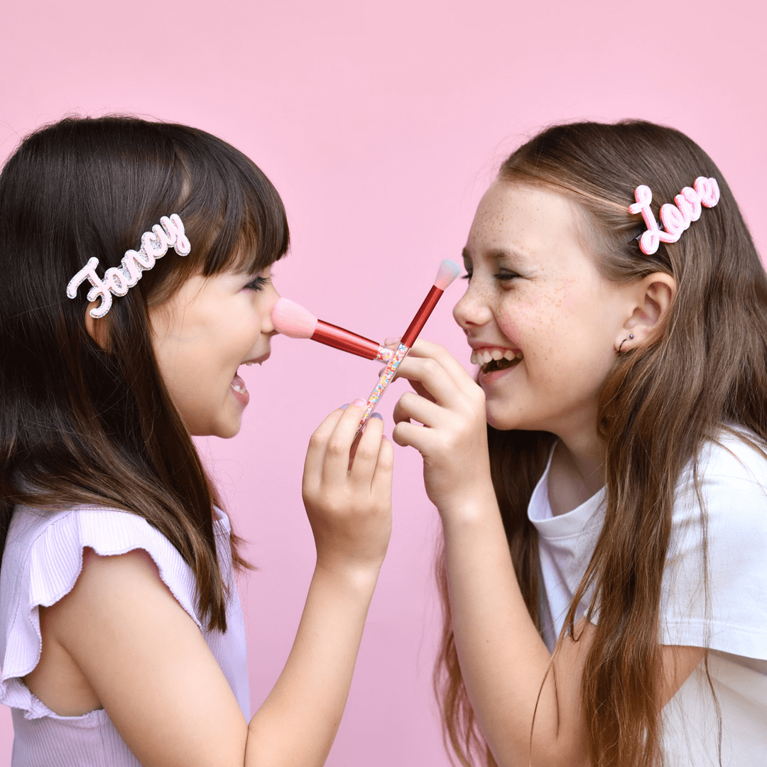 Girls playing with natural No Nasties Kids makeup together