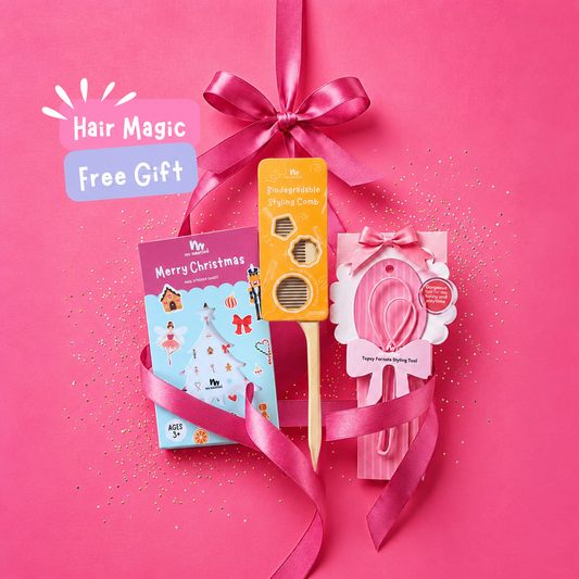 A hair magic gift set on a bright pink background, featuring a pink ribbon bow, a package of Christmas nail sticker sheets, a comb, and a pink hair styling tool. Text overlay reads 'Hair Magic Free Gift' on a bright pink background