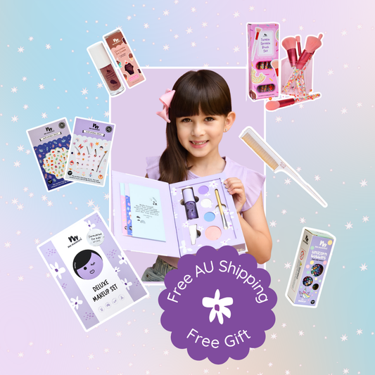 Young girl holding a makeup set with cosmetic items displayed around her on a colorful background.