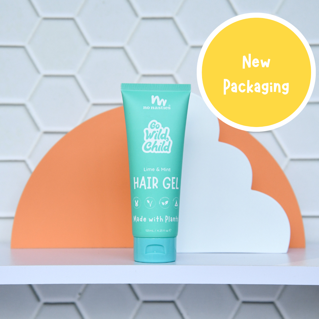 Turquoise hair gel tube with 'Go Wild Child' branding on a geometric patterned background