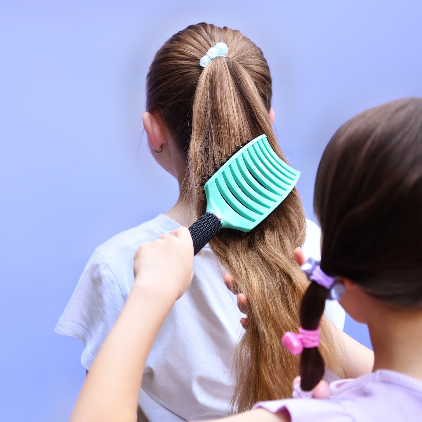 Aqua detangler brush used on wet or dry kids hair