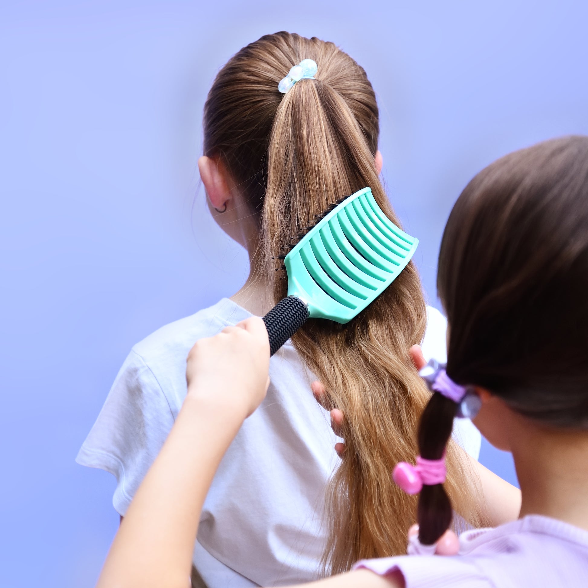 Aqua detangler brush used on wet or dry kids hair