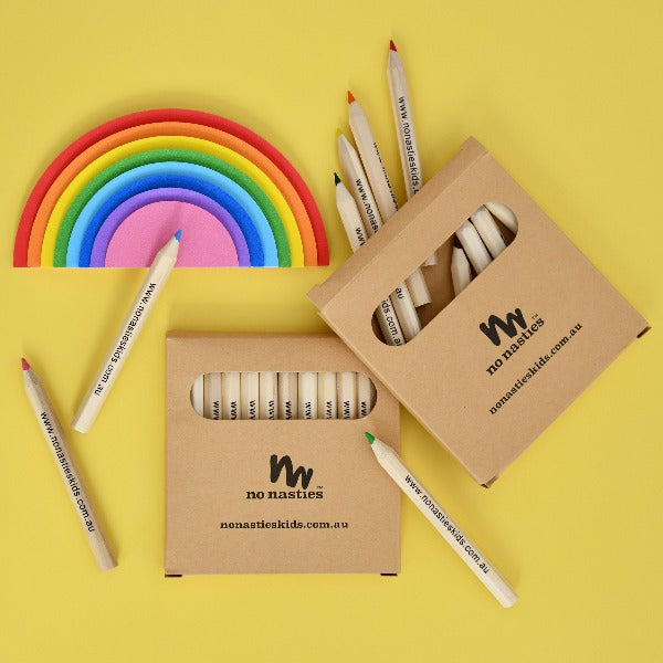 coloured-pencils-and-rainbow-on-yellow-background