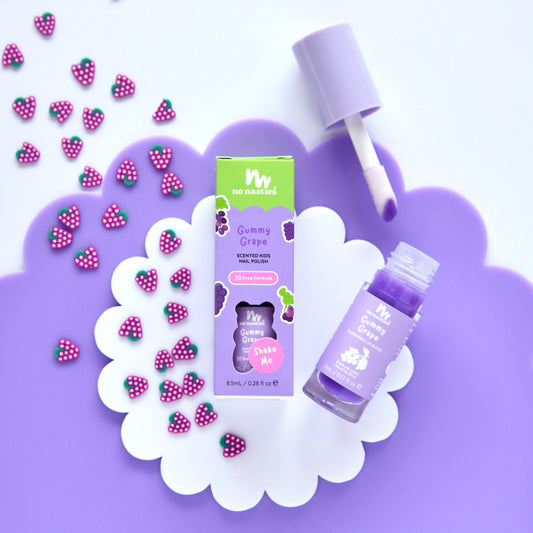 Gummy Grape product packaging with a dropper and gummy bears on a purple background