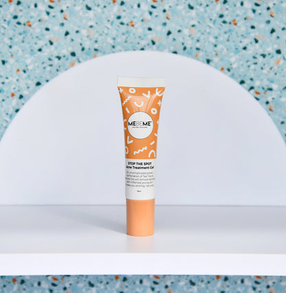 Tube of MeMe Skin treatment gel on a white surface with a blue textured background