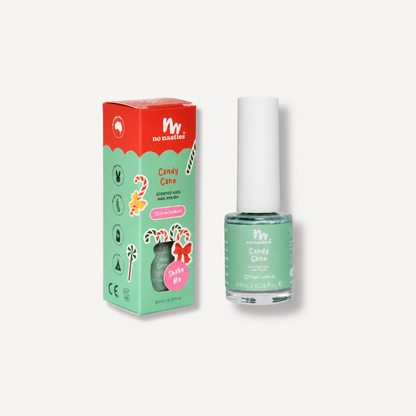A bottle of No NAsties Kids candy cane nail polish next to its matching retail box, featuring a festive green and red holiday design on a light off-white background.