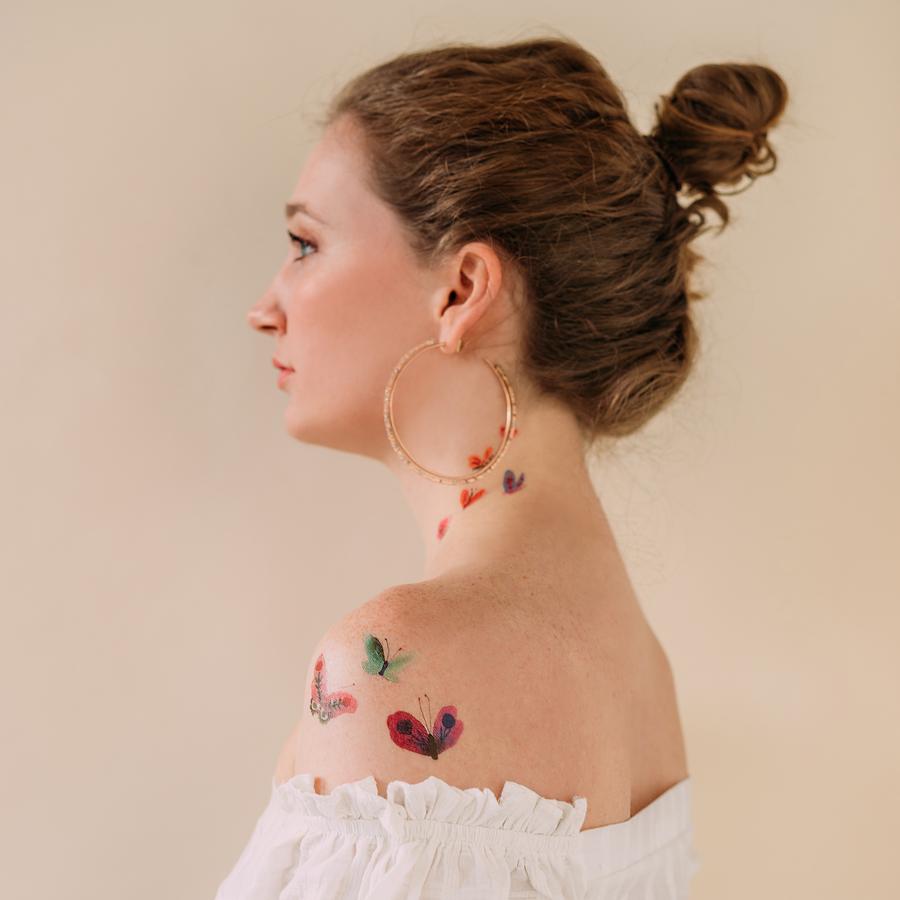 temporary-butterfly-tattoos-on-womans-neck-and-shoulder