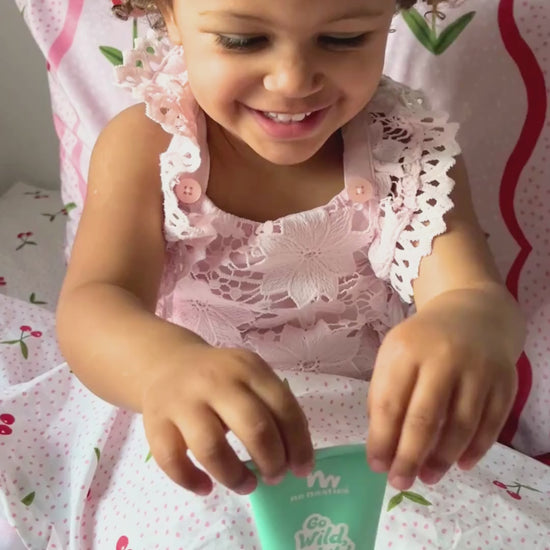 video-little-girl-in-pink-lace-dress-holding-no-nasties-kids-hair-gel