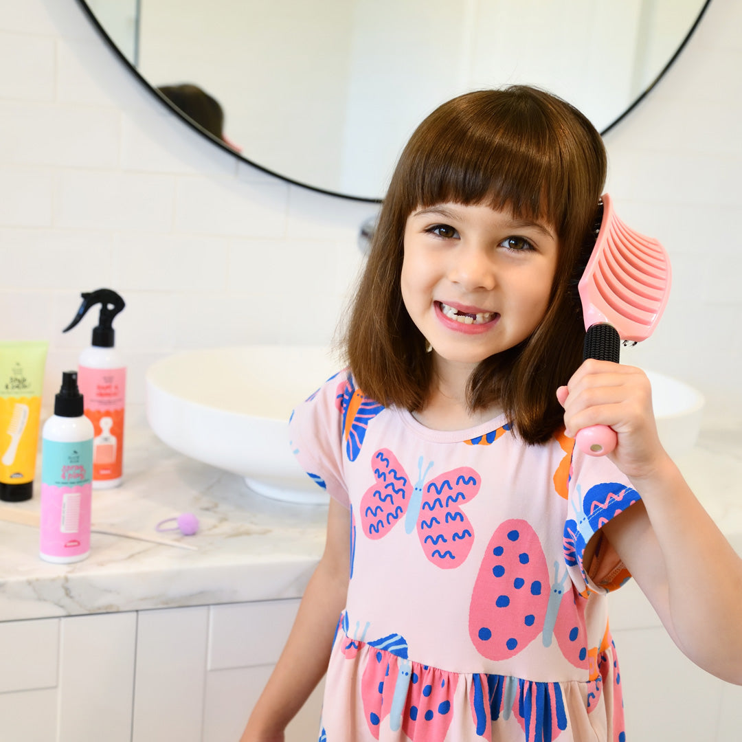 Detangler hair brush lifestyle photo with child