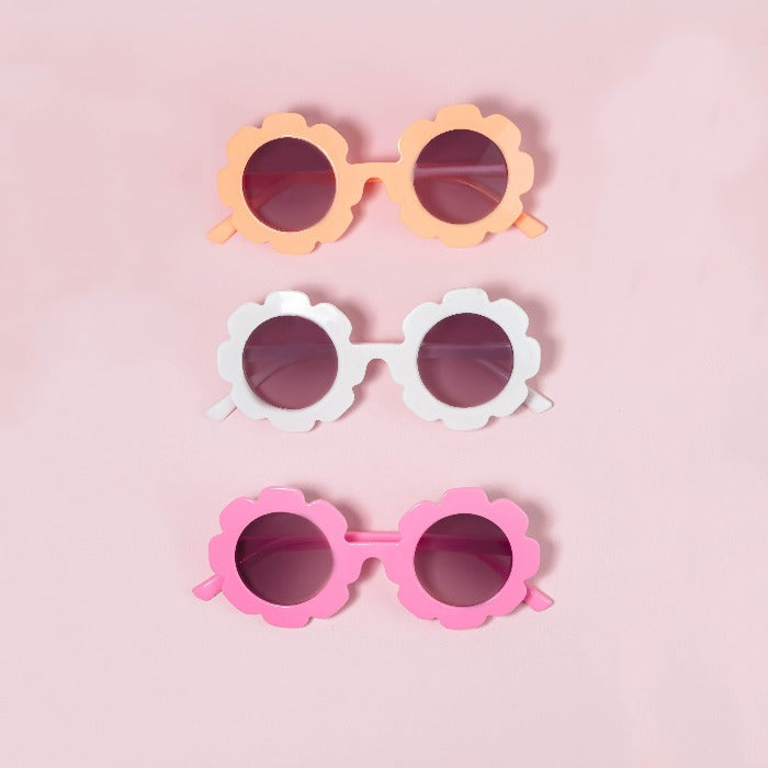 peach-pink-and-white-sunglasses-on-pink-background